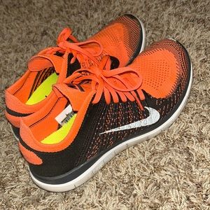 Brand: Nike / Size: US 8.5 / Color: Orange and Dark Gray